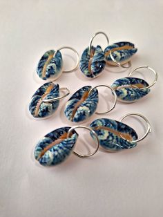 Set of 8 loc rings made with hand painted cowrie shells on stainless steel rings.  Rings open to fit all locs and braids. Unique Hand-painted Jewelry For Beach, Unique Hand Painted Jewelry For Beach, Loc Rings, Afro Jewelry, Braid Rings, Dreadlock Jewelry, Hair Decor, Dope Jewelry Accessories, Hair Charms