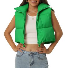 The winter cropped vests offer you multiple choices of colors. These nice quality puffer jackets must be a must-have for your wardrobes. Lightweight vest with puffy padding inside which is designed to keep you warm and comfy. Cropped puffer vests are a must-have in today's fashion, and can be worn with a crop sleeveless top/long sleeve shirt/sweater/hoodie/dresses for a casual look. High-quality zipper works smoothly. Adjustable drawing on the hem can shape a flattering fit. The padded cropped v Solid Puffer Sleeveless Vest, Trendy Sleeveless Winter Puffer Jacket, Trendy Vest Outerwear, Trendy Green Winter Vest, Sleeveless Puffer Jacket For Fall, Trendy Puffer Vest For Fall, Trendy Winter Puffer Vest, Trendy Fall Puffer Vest, Trendy Green Vest For Fall