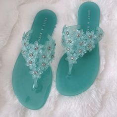 Color Turquoise. Never Worn New In Box. Size 7. Floral With Crystal Blue Jelly Sandals With Round Toe For Party, Blue Jelly Sandals For Spring Party, Blue Jelly Sandals For Summer Party, Blue Jelly Sandals For Spring Vacation, Green Leather Sandals, Summer Sandals Heels, Fancy Sandals, Jelly Flip Flops, Crystal Sandals