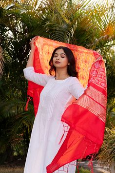 Celebrate any occasion in style with our silk blend patola dupatta. Crafted with care, each piece is elegant and unique. Enjoy the exclusivity of our limited edition collections and savor the slow fashion journey with us. Care: Consider dry cleaning or hand washing as preferable options, as machine washing may increase the likelihood of damaging the dupatta. Dupatta Length: Approx 2 meters * 0.5 metersUsage: Evening, Weddings, Festivals, Parties or any other special occasions.Perfect Gifting Solution: They also make ideal gifts for daughters, mothers, grandmothers, colleagues, partners, students, girlfriends, brides, bridesmaids, wives, wedding gifts, Ramadan, Eid gifts, Diwali Our soft and luxurious Patola cotton-silk dupatta, is perfect for any occasion. This dupatta is the perfect acces Velvet Scarf, Woolen Scarves, Bazaar Crafts, Bags Leather Handbags, Potli Bags, Pashmina Scarf, Silk Dupatta, Headband Styles, Summer Scarves