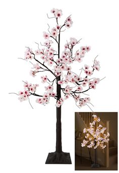 a white and pink tree with flowers on it