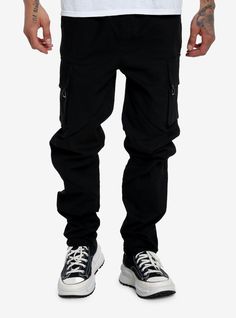 Up close  these black cargo pants have so much detail. Their cargo pockets have pleating on the flaps  and the legs have diagonal folded seams going down the front. Elasticated  drawstring waist.98% cotton; 2% spandexWash cold; dry lowRIse: 13"Inseam: 31"Leg opening: 7"ImportedListed in men'sunisex sizesModel is 6'1"Model wears size Medium Techwear Cotton Cargo Pants With Flap Pockets, Techwear Style Cotton Cargo Trousers, Cotton Techwear Cargo Trousers, Techwear Cotton Cargo Trousers, Techwear Cotton Cargo Jeans, Black Tapered Leg Cargo Jeans In Cotton, Techwear Black Pants With Flap Pockets, Techwear Cotton Cargo Pants With Tapered Leg, Techwear Style Tapered Leg Cotton Cargo Pants