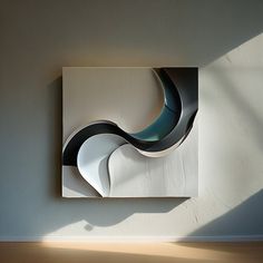 an abstract sculpture is mounted on the wall