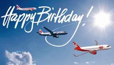 two airplanes flying in the sky with happy birthday written on them