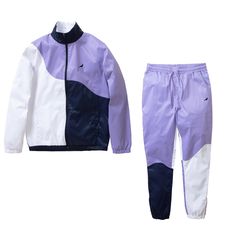 Buy Men's Staple Pigeon Nassau Nylon Tracksuit Set in Purple - Swaggerlikeme.com Sporty Spring Tracksuit With Pockets, Casual Spring Training Track Jacket, Casual Nylon Tracksuit For Streetwear, Casual Nylon Windbreaker For Training, Sporty Tracksuit For Spring Streetwear, Color Block Nylon Windbreaker Sportswear, Casual Windbreaker With Contrast Panels For Streetwear, Sporty Patchwork Track Jacket For Spring, Nylon Color Block Windbreaker In Athleisure Style