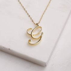 "G Initial Necklace - Cursive \"G\" initial gold pendant - Personalized initial gold pendant for women / Gift for her / for mom / for wife / Dainty \"G\" initial. Perfect every day necklace. Lovely gift for your self, sister, bridesmaids, new mom. Convo me if you would like to customize the length of the chain. The possibilities are endless. Pendant: Base metal is brass and 16K gold plated. Chain is 18 inches, 14k gold filled. (if you would like a longer or shorter chain, please contact us to cu Cheap Initial Pendant Necklace, Cheap Necklaces With Letter Print Initial Pendant, Cheap Initials Pendant Necklace, Cheap Initial Necklaces For Gifts, Cheap Initials Necklaces For Gifts, Cheap Trendy Necklaces With Initial Pendant, Cheap Handmade Initial Pendant Jewelry, Cheap Initial Letter Necklace As Gift, Cheap Adjustable Initial Pendant Necklace