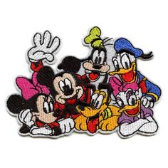 three mickey mouses with goofy and pluto on their backs, one is pointing at the other