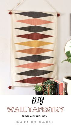 a wall tapestry hanging on the wall with text overlay that reads diy wall tapestry