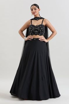 Black solid lehenga with an attached cancan, sequins, cutdana, bead work floral embroidered waistband. Comes with coordinating embroidered padded blouse and choker dupatta. - Aza Fashions Glamorous Black Georgette Lehenga, Party Lehenga With Zari Work And Fitted Bodice, Floor-length Party Sets With Fitted Bodice, Party Floor-length Sets With Fitted Bodice, Party Sets With Fitted Bodice And Floor-length, Fitted Organza Anarkali Set For Party, Festive Party Lehenga With Fitted Bodice, Festive Party Sets With Fitted Bodice, Fitted Georgette Glamorous Lehenga