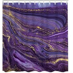 a purple and gold marble shower curtain