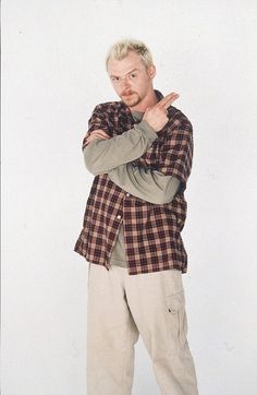 a man standing with his arms crossed in front of him