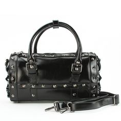 Let your rebellious spirit shine with the Dual Skull Satchel Bag! Made of high-quality vinyl, this bag features a unique protruding skull design, zippered main closure, and fabric lined interior. With attached top handles and an adjustable/detachable shoulder strap, it's both functional and edgy. Measures 13x2.5x7.5 inches. Gothic Party Bag With Zipper Closure, Black Alternative Style Bag With Zipper Closure, Alternative Style Black Bag With Zipper Closure, Punk Party Bags With Zipper Closure, Gothic Bags With Zipper Closure For Concerts, Black Punk Bag With Detachable Strap, Punk Style Rectangular Shoulder Bag With Zipper, Black Bags With Zipper Closure For Concerts, Punk Style Satchel Shoulder Bag With Zipper Closure