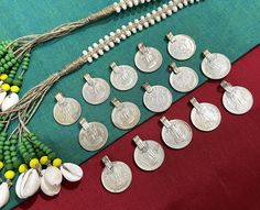 These extremely beautiful ethnics looking 25 paise coins are old looking Indian banjara metal charms for your ethnic jewelry. They are silver in color and very light in weight. They're approx. 19 mm in diameter and its length is 24 mm approx. You will receive a set of 15 pieces. Traditional Handmade Coin Necklace, Traditional Coin Pendant Necklace For Festivals, Traditional Silver Coin Necklace For Festivals, Ethnic Looks, Metal Charms, Metal Charm, Ethnic Jewelry, Belly Dance, Jewelry Supplies