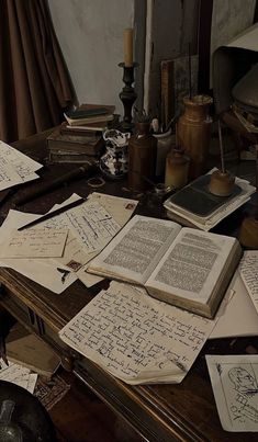 an old desk covered with lots of papers and writing on top of eachother