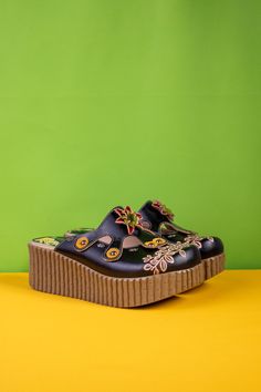 Make all of your summer dreams come true with the Soffia Timeless Beauty Floral Embossed Leather Platform Clog! This sassy stunner features a timeless floral-embossed leather construction that will bring a splash of style to any outfit. Step out in style and let Soffia bring all the summer vibes! 2.16'' heel with 1'' platform Slip-on Genuine leather upper Leather lining Leather insole Rubber sole Leather Sandals With Floral Print And Round Toe, Black Leather Footbed Clogs For Summer, Reindeer Headband, Wine Top, Platform Clogs, Summer Dream, Daily Dress, Dress Jewelry, Dreams Come True