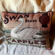 an old swan brand pillow on a bed