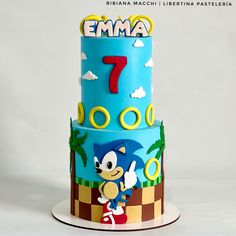 a birthday cake with sonic the hedgehog on it's top and number seven