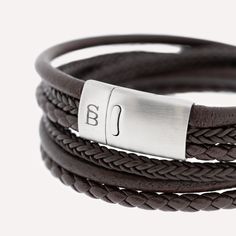 This wraparound bracelet stack, handcrafted from fine grade genuine leather and meticulously braided, is a timeless classic marked by elegance.- WIDTH: 12 mm- MATERIAL TYPE: 100% genuine Cowhide leather- CLASP COLOR: Brushed silver- CLASP MATERIAL: 316L stainless steel- CLASP TYPE: Magnetic Double Wrap Bracelet, Gold Armband, Bracelet Cuir, Black Edition, Handcrafted Leather, Bracelet Stack, Timeless Classic, Cowhide Leather, Wrap Bracelet