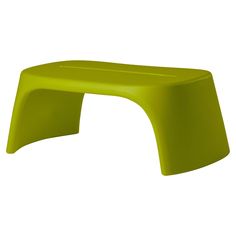 a bright green plastic table on a white background