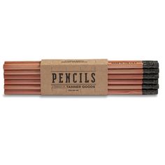 the pencils are made from wood and have black erasers on top of them