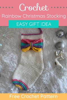 a crochet christmas stocking with the text, rainbow christmas stockings easy gift idea free crochet pattern