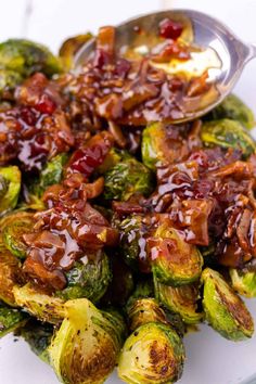 brussel sprouts with bacon and maple syrup on a white platter