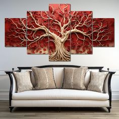 a living room scene with a couch and paintings on the wall in red tones,