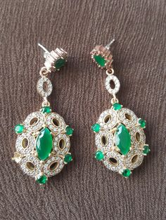 hurrem sultan, hurrem jewelry, Turkish jewelry, harem earring, ottoman earring, joyera turca, trkischer schmuck, bijoux hurrem, grand bazaar jewelry, osmanisch ohrringe, schmuckbasar, Turkish seller, grand bazaar earring Specifications:   Earring Length: 2.3 Inch / 6 CM Head Size: 35x26 mm Material: 925 Sterling Silver& Bronze Stones: Emerald & Topaz (lab created) Weight: 22 Grams Stamped: 925 Main Stone Creation:Lab-Created/Cultured * All our Jewelry is handcrafted and handmade in Europe with t Turkish Earrings, Jewelry Gold Turkish, Traditional Turkish Jewellery, Turkish Pendant Jewelry, Antique Iberian Earrings, Turkish Jewelry, Wedding Jewelry Earrings, 925 Sterling Silver Earrings, Wedding Earrings