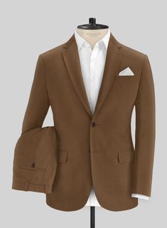 It's time to spice things up with our Italian Hickory Brown Cotton Stretch Suit. Meticulously crafted from a premium blend of cotton and lycra, this suit elevates your suiting game with the latest and most astonishing style, creating a sleek and streamlined silhouette. Moreover, the rich and solid texture of the fabric Grey Tweed Suit, Herringbone Tweed Jacket, White Linen Suit, Green Velvet Jacket, Peaky Blinders Suit, Royal Blue Suit, Navy Blue Chinos, Solid Texture, Blue Chinos