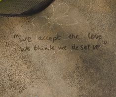 someone wrote this on the sidewalk in front of their house that says, i have accept the love we think we deserves