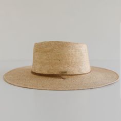 DESCRIPTION Crafted with exotic Guatemalan Palm Straw and hand shaped in Texas, USA, the Monterrico is a sturdy, toasted colored straw hat shaped into a teardrop fedora crown and wide, flat brim that offers amazing sun protection. Trimmed with a brown, genuine leather chinstrap and leather slider, the Monterrico is the perfect summer companion, and is built to stick with you for years to come. UPF Rating: 50 + (Excellent) HAT SIZE CHART Available in 55 S, 57 M, 59 L, 61 XL and 63 XXL. Due to the Brown Flat Crown Straw Hat For Vacation, Adjustable Natural Color Fedora With Flat Crown, Natural Fedora With Adjustable Flat Crown, Adjustable Natural Fedora With Flat Crown, Brown Toquilla Straw Sun Hat With Flat Crown, Brown Flat Crown Toquilla Straw Sun Hat, Summer Fedora With Adjustable Flat Crown, Spring Fedora With Flat Crown In Natural Color, Natural Fedora With Flat Crown For Spring