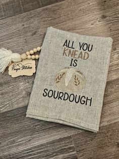 a book with the words, all you knead is sourdough on it