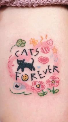 a woman's stomach with tattoos on it and the words cats are for ever