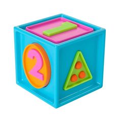 a toy cube with numbers and shapes on it