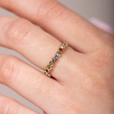 An elegant rainbow sapphire ring in 14K solid gold in bezel setting. A unique eternity wedding band for women, ideal for stacking with colored engagement ring. The best Valentines Day Gift for her! 100% handcrafted with love! PRODUCT DETAILS * Metal: 14K solid gold, 14K white gold or 14K rose gold * Gemstone: 21 Sapphires, Round cut * Sapphires' Weight: 0.84ct total RING SIZING For General Reference: * we use standard US Ring Sizing * an average women's ring finger is size 6 * if your ring size Rainbow Gemstone Stackable Rings For Anniversary, Colored Engagement Ring, Wedding Rings Pink Sapphire, Best Anniversary Gifts, Stacked Wedding Bands, Sapphire Wedding Rings, Rainbow Sapphires, Best Valentine's Day Gifts, Colored Engagement Rings