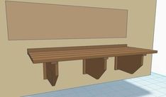 a wooden bench sitting in the middle of a room next to a wall with no one on it