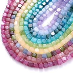 multicolored glass beads are arranged in a circle