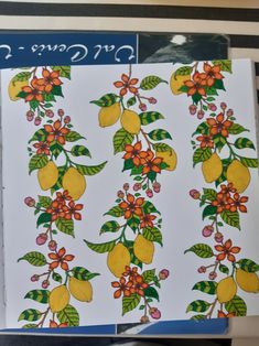 a card with lemons and leaves on it