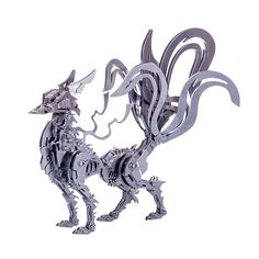 a metal figurine of a dog with long tail and large horns on its head