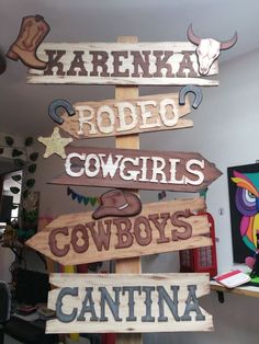 a wooden sign that says rodeo cowgirls, cowboys, and santa fez