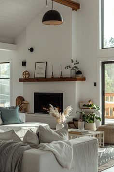 a living room filled with furniture and a fire place