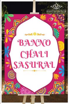 a sign with the words banno chaal sasura written in pink and yellow