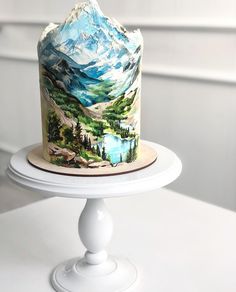 there is a cake with mountains on it