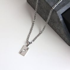 A meaningful stainless steel playing card pendant necklace that will not tarnish or rust over time, even when worn in the water. 💎Free shipping on all orders💎Waterproof and non-tarnish💎Packaging that is ready to offer as a gift💎Customizable and adjustable chain length The card pendant necklace, a meaningful necklace Whether you're a lover of card games, a risk-taker, or simply appreciate the symbolism of the ace of cards, this necklace is the perfect accessory to express your individuality. Necklaces On Playing Cards, Ace Of Cards, Spade Playing Card, Meaningful Necklace, Risk Taker, Chain For Men, Ace Of Spades, Figaro Chains, Figaro Chain