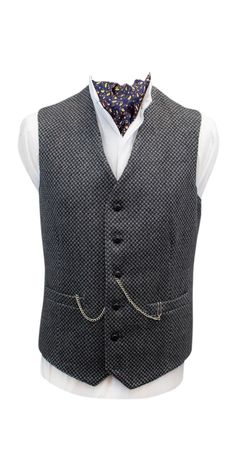 Griffin | Men's Dark Grey Waistcoat with Light Grey Diamond Pattern | Men's Tweed Vest Complement your tweed jacket with one of our handwoven tweed waistcoats. This dark grey tweed waistcoat is a timeless investment piece. This grey tweed fabric has been expertly handwoven and made into a true piece of Irish design. This waistcoat can be styled with casual suits, sports jackets, and with business wear. Handmade by our expert tailors in Balbriggan, North Co. Dublin. This grey color offers the wea Mens Tweed Waistcoat, Mens Tweed Vest, Grey Waistcoat, Wedding Vest, Tweed Men, Herringbone Vest, Casual Suits, Tweed Waistcoat, Sports Jackets