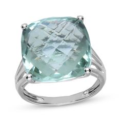 Make a colorful style statement with this thrilling cocktail ring. A faceted cushion-cut green quartz is the flashy centerpiece, while dainty diamond accents underneath add a shimmery detail. This sterling silver ring is a bold and sparkly look that's perfect for a night out. Fine Jewelry Cushion-cut Topaz Ring With Gemstone Accents, Fine Jewelry Cushion Cut Topaz Ring With Gemstone Accents, Elegant Green Topaz Ring In Sterling Silver, Modern Green Amethyst Jewelry, Elegant Cushion Cut Topaz Ring With Gemstone Accents, Modern Jewelry With Diamond Cushion Cut, Modern Green Jewelry With Accent Stones, Modern Cushion Cut Rings With Accent Stones, Modern Silver Cushion Cut Rings