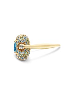 With REVERSE rings, luxury marries the dynamism of creativity, of invention, of surprise: with a simple rotation, in fact, this 18 kt gold ring will show you its precious double! REVERSE alternates a doublette with Mother of pearl and LONDON Blue Topaz and pavè of Blue Diamonds, Green Sapphires and Swiss Blue Topaz. A sumptuous game of lights that will surprise you every time you'll wear it. Natural stones: - BLUE DIAMOND Weight (total): 0.40 CT - SKY BLUE TOPAZ Weight (total): 0,19 CT - SWISS B Luxury Blue Birthstone Ring, Classic Wedding Rings, Yemen, Sky Blue Topaz, Vanuatu, Green Sapphire, Swiss Blue Topaz, Samoa, Iraq