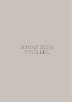 the words romanticise your life written in white on a gray background with an image of a