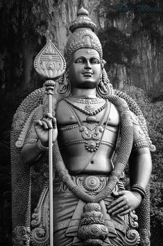 the statue of lord rama is shown in black and white