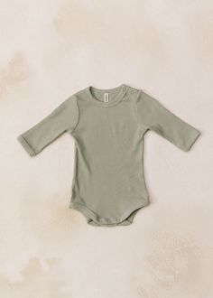 new and improved onesie design functioning snaps soft to the touch, stretchy 47% Rayon 47% Cotton 6% Spandex Cozy Pajamas, New And Improved, Egift Card, Onesies, Baby Clothes, Pajamas, Spandex, Grey, Long Sleeve